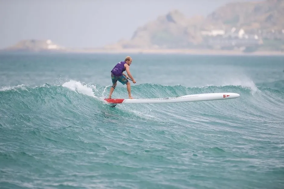 Surfing with SUP Race Board